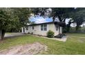 Inviting single-story home with a well-maintained lawn and easy access to the front entrance at 3440 S Nashville Ave, Orlando, FL 32839