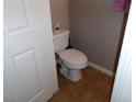 Clean, well-maintained toilet area with tile flooring, ensuring hygiene and ease of maintenance at 1285 S South Beach Circle Cir, Kissimmee, FL 34746