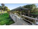 Private boat dock on the water, ideal for boating and enjoying waterfront living at 1475 Kettledrum Trl, Deltona, FL 32725