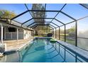 Screened-in pool, perfect for hot days and relaxing at 1475 Kettledrum Trl, Deltona, FL 32725
