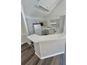 Kitchen boasts white cabinets and ample counter space at 3291 Westchester Square Blvd # 203, Orlando, FL 32835