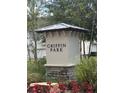 Griffin Park entrance sign surrounded by mature trees and manicured landscaping at 936 Wild Date Ln, Lake Mary, FL 32746