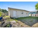 The backyard offers potential with ample space and a cozy, private setting at 1716 2Nd Ne St, Winter Haven, FL 33881