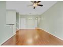 Spacious living room showcasing hardwood floors and an open layout at 2040 Retreat View Cir, Sanford, FL 32771