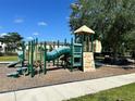 Community playground featuring play structure for active play and outdoor fun at 1968 Compass Flower Way, Ocoee, FL 34761