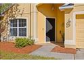 Inviting front entrance with neat landscaping at 4424 Park Eden Cir, Orlando, FL 32810