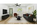 Cozy living room features a modern ceiling fan, sleek furniture and light wood floors at 5603 Marie Ct, Orlando, FL 32818