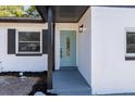 Close-up of the front door, highlighting its stylish design and welcoming entrance at 5603 Marie Ct, Orlando, FL 32818