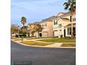 Exterior street view features well-maintained lawns and landscaping, showcasing the community's inviting neighborhood appeal at 10071 Cypress Knee Cir, Orlando, FL 32825