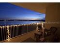 Balcony seating with lights, providing relaxing space to enjoy the view and fresh air at 6336 Buford St # 602, Orlando, FL 32835