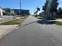 Enjoy the calm of this quiet street lined with houses and palm trees, leading to the beach at 529 Hillside Nw Ave, Daytona Beach, FL 32118