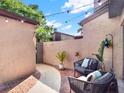 Relaxing courtyard featuring an outdoor seating area with brick pavers and a privacy wall at 1105 Woodbine St, Fern Park, FL 32730