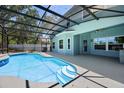 Beautiful pool area with screened enclosure, perfect for enjoying the outdoors at 2204 Hammock Moss Dr, Orlando, FL 32820