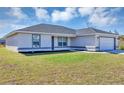 Charming single-story home with well-manicured lawn, attached garage, and inviting curb appeal at 16171 Sw 44Th Cir, Ocala, FL 34473