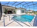 Stunning screened-in pool area, perfect for relaxing and entertaining guests in luxury at 2055 Quiet Cv, Sanford, FL 32771