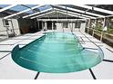 Screened-in backyard pool offering an ideal spot for relaxing and entertaining in a private outdoor setting at 122 W Hillcrest St, Altamonte Springs, FL 32714