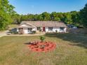 Charming home with red door and well maintained front yard at 133 Orange Ridge Dr, Longwood, FL 32779