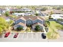 Aerial view showcasing the condo's parking and community amenities at 115 Orchid Dr, Davenport, FL 33897