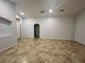 Bright living room with tile flooring, neutral walls and recessed lighting at 2315 Northern Leaf St, Orlando, FL 32817