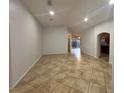 Spacious living room featuring neutral walls and tile flooring throughout at 2315 Northern Leaf St, Orlando, FL 32817