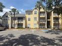Condo building featuring private balconies and convenient parking at 1017 S Hiawassee Rd # 3735, Orlando, FL 32835