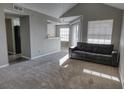 Spacious living area with connecting breakfast bar and abundant light at 1017 S Hiawassee Rd # 3735, Orlando, FL 32835