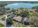 Panoramic aerial view of the property showcasing the lakefront location and neighborhood at 2136 Topping Pl, Eustis, FL 32726