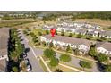This aerial view highlights the home's proximity to green spaces and the layout of this residential community at 9513 Amber Chestnut Way, Winter Garden, FL 34787