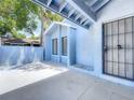 Entrance featuring a white security door and large windows at 2253 Atrium Cir, Orlando, FL 32808