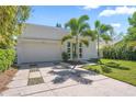 Beautiful single-story home with a well-kept yard, two-car garage, and contemporary architecture at 2411 Center Ave, Orlando, FL 32806