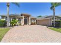 Lovely home with brick driveway and well maintained landscaping at 2480 Northumbria Dr, Sanford, FL 32771
