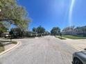 Residential street view, showcasing the neighborhood's quiet atmosphere at 2625 Queen Mary Pl, Maitland, FL 32751