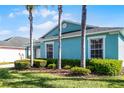 Charming single-story home with well-maintained landscaping and lush green lawn at 631 Reserve Dr, Davenport, FL 33896