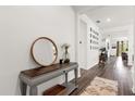 Welcoming entryway with hardwood floors, decorative accents, and bright, neutral walls at 1025 Augustus Dr, Davenport, FL 33896