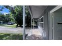 View of the covered front porch showing the walkway and entrance at 2421 Laura Pl, Orlando, FL 32803