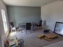 Bright dining room with a table, chairs, and natural light streaming through the window, ready for Gathering meals at 268 Fiddlewood Ct, Davenport, FL 33837