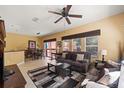 Open concept living area with dining space and sliding glass doors to the patio at 4772 Vero Beach Pl, Kissimmee, FL 34746