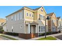 Beautiful home exterior with beige stucco and decorative light post at 543 Wishbone Ln, Lake Mary, FL 32746
