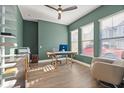 Spacious home office with modern desk and ample natural light at 543 Wishbone Ln, Lake Mary, FL 32746