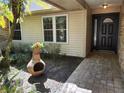 Well-maintained front entrance with beautiful landscaping and neutral siding at 736 Silverwood Dr, Lake Mary, FL 32746
