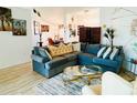 Comfortable living room with large sectional sofa and bright natural light at 13405 Sw 86Th Ave, Ocala, FL 34473