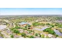 An aerial shot showcasing the property's location in a well-maintained neighborhood with water views at 750 Sterling Spring Rd, Orlando, FL 32828