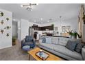 Inviting living space featuring modern furniture and an open layout at 808 Grandin St, Davenport, FL 33837