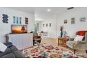 Comfortable living room showcasing the decor with an open view of the dining area at 4482 Se 142Nd St, Summerfield, FL 34491