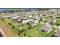 A charming neighborhood with stunning lake views and community dock access at 4672 Marina Row Dr, Orlando, FL 32820