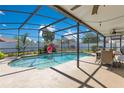 Enjoy this refreshing screened-in pool and patio, perfect for outdoor entertaining and relaxation at 5263 Jade Cir, Belle Isle, FL 32812