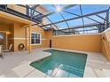 Relaxing screened-in pool with deck, perfect for outdoor living and entertaining at 8963 Majesty Palm Rd, Kissimmee, FL 34747