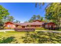 Beautiful house featuring well-maintained landscaping and architectural roofline at 160 Archers Pt., Longwood, FL 32779