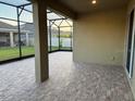 The spacious screened-in patio offers a comfortable outdoor living space at 4036 Parkhouse Dr, Orlando, FL 32824