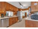 Functional kitchen with stainless steel appliances and ample counter space at 2829 Aloma Ave, Winter Park, FL 32792